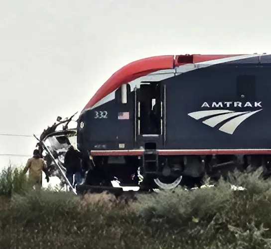 Two uninjured in crash with Amtrak train